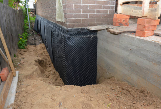 Happy homeowners after waterproofing job in Harrisburg